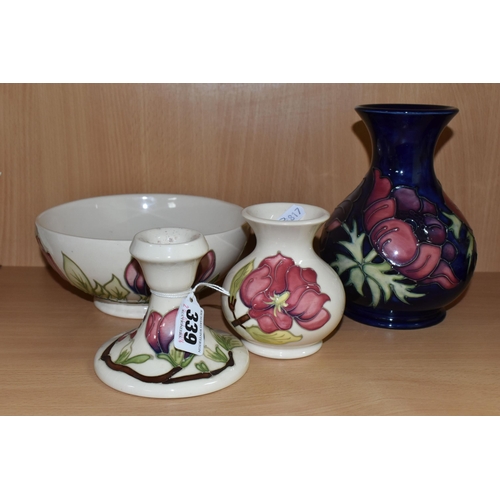 339 - FOUR PIECES OF MOORCROFT POTTERY, comprising an Anemone pattern baluster vase, tube lined with pink ... 