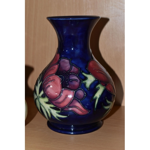 339 - FOUR PIECES OF MOORCROFT POTTERY, comprising an Anemone pattern baluster vase, tube lined with pink ... 