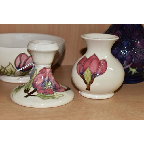 339 - FOUR PIECES OF MOORCROFT POTTERY, comprising an Anemone pattern baluster vase, tube lined with pink ... 