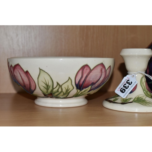 339 - FOUR PIECES OF MOORCROFT POTTERY, comprising an Anemone pattern baluster vase, tube lined with pink ... 