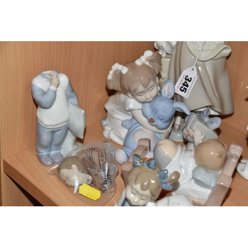 345 - A LLADRO FIGURE AND A GROUP OF NAO FIGURES, comprising Lladro Girl with Doves/ Pigeons, no 4915, scu... 