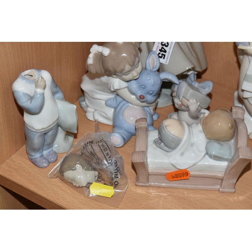 345 - A LLADRO FIGURE AND A GROUP OF NAO FIGURES, comprising Lladro Girl with Doves/ Pigeons, no 4915, scu... 