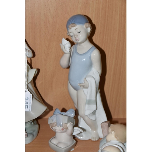 345 - A LLADRO FIGURE AND A GROUP OF NAO FIGURES, comprising Lladro Girl with Doves/ Pigeons, no 4915, scu... 