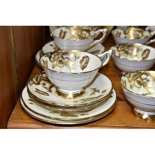 351 - A FORTY TWO PIECE ROYAL STAFFORD TEA SET, decorated with gilt poppies on a cream ground, pattern no ... 