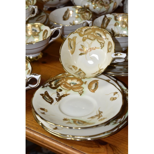 351 - A FORTY TWO PIECE ROYAL STAFFORD TEA SET, decorated with gilt poppies on a cream ground, pattern no ... 