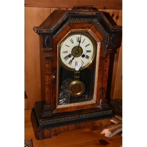 352 - A GROUP OF CLOCKS, comprising a cuckoo clock with weights and pendulum, with cuckoo and guitar playe... 