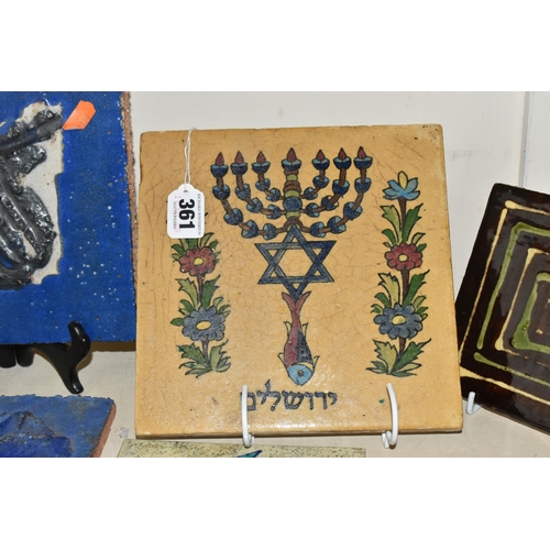 361 - A GROUP OF ELEVEN ASSORTED CERAMIC TILES to include a large glazed Jewish tile depicting a 'seal of ... 