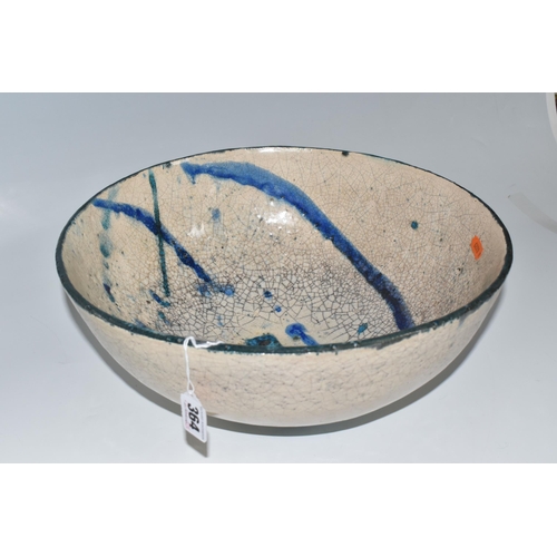 364 - CATRIONA McLEOD: A LARGE RAKU FIRED BOWL, decorated with blue and turquoise bands on a cream crackle... 