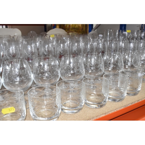 373 - A VICTORIA COLLECTION GLASS SUITE comprising a large quantity of etched patterned glasses to include... 