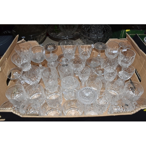 376 - A LARGE QUANTITY OF CRYSTAL CUT GLASSWARE to include two decanters, two vases, a group of bowls, a c... 