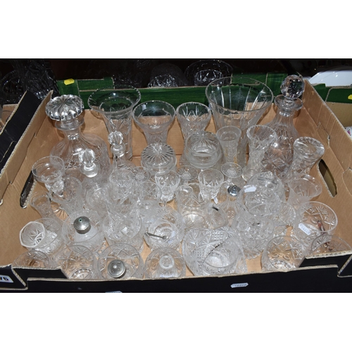 376 - A LARGE QUANTITY OF CRYSTAL CUT GLASSWARE to include two decanters, two vases, a group of bowls, a c... 