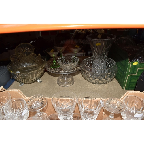 376 - A LARGE QUANTITY OF CRYSTAL CUT GLASSWARE to include two decanters, two vases, a group of bowls, a c... 