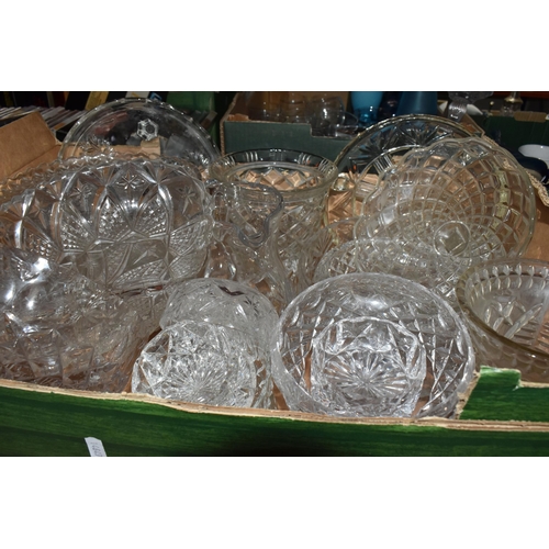 376 - A LARGE QUANTITY OF CRYSTAL CUT GLASSWARE to include two decanters, two vases, a group of bowls, a c... 