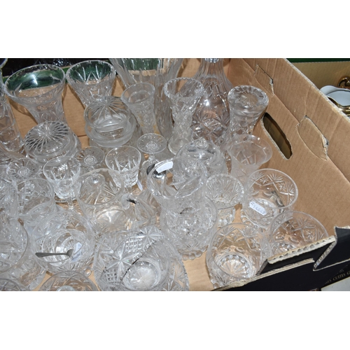 376 - A LARGE QUANTITY OF CRYSTAL CUT GLASSWARE to include two decanters, two vases, a group of bowls, a c... 