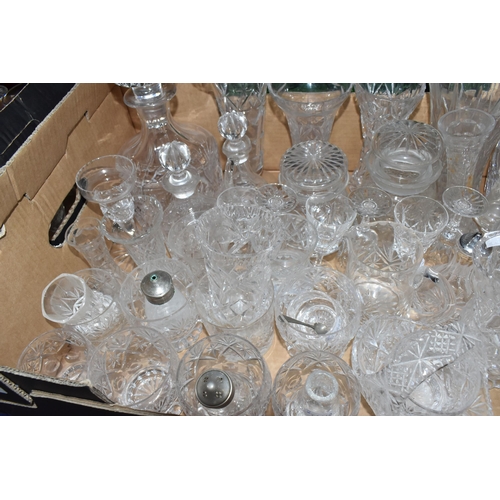 376 - A LARGE QUANTITY OF CRYSTAL CUT GLASSWARE to include two decanters, two vases, a group of bowls, a c... 