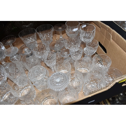 376 - A LARGE QUANTITY OF CRYSTAL CUT GLASSWARE to include two decanters, two vases, a group of bowls, a c... 