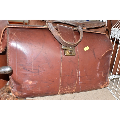 381 - A GROUP OF LARGE ITEMS comprising four leather satchels to include two Cheney expanding bags, a pair... 