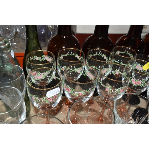 383 - A LARGE QUANTITY OF  ASSORTED GLASSWARE to include seven vintage brown glass ale bottles to include ... 