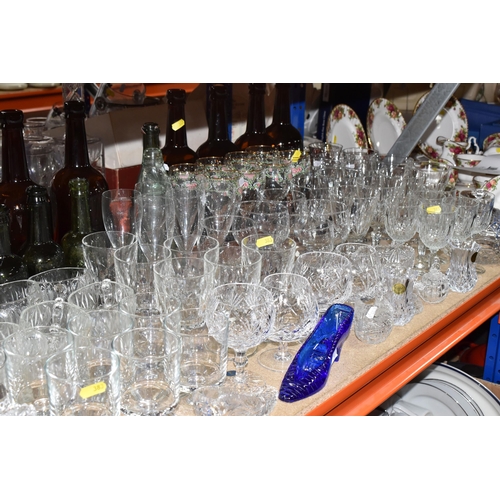 383 - A LARGE QUANTITY OF  ASSORTED GLASSWARE to include seven vintage brown glass ale bottles to include ... 