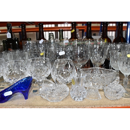 383 - A LARGE QUANTITY OF  ASSORTED GLASSWARE to include seven vintage brown glass ale bottles to include ... 