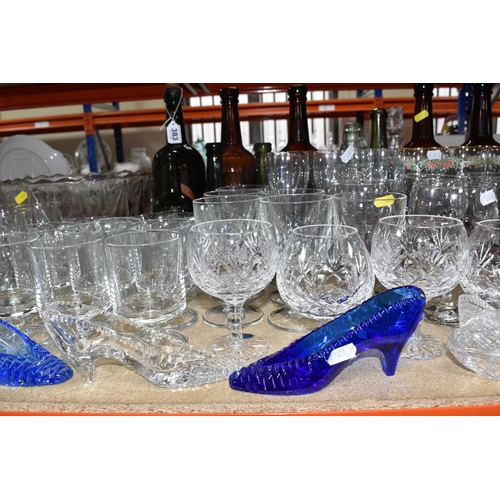 383 - A LARGE QUANTITY OF  ASSORTED GLASSWARE to include seven vintage brown glass ale bottles to include ... 