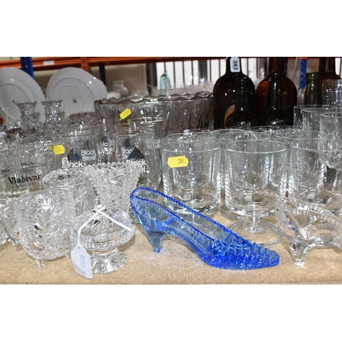 383 - A LARGE QUANTITY OF  ASSORTED GLASSWARE to include seven vintage brown glass ale bottles to include ... 