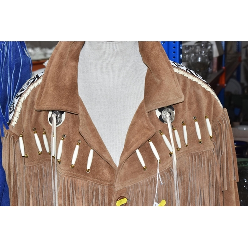 387 - TWO WESTERN STYLE FRINGED JACKETS, a blue leather/suede fringed detail jacket, size XXL, label insid... 