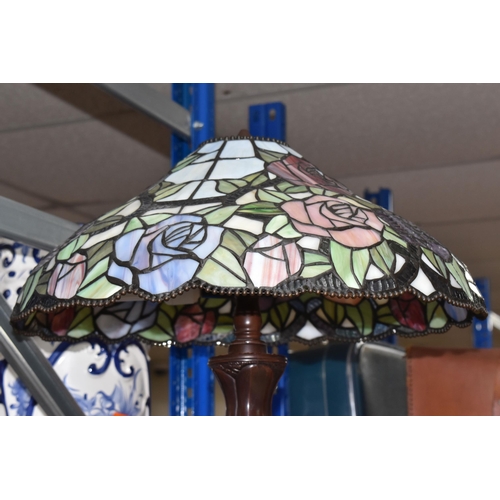 388 - A TIFFANY STYLE TABLE LAMP, Tiffany style leaded floral shade, twin bulb table lamp, bronze effect m... 