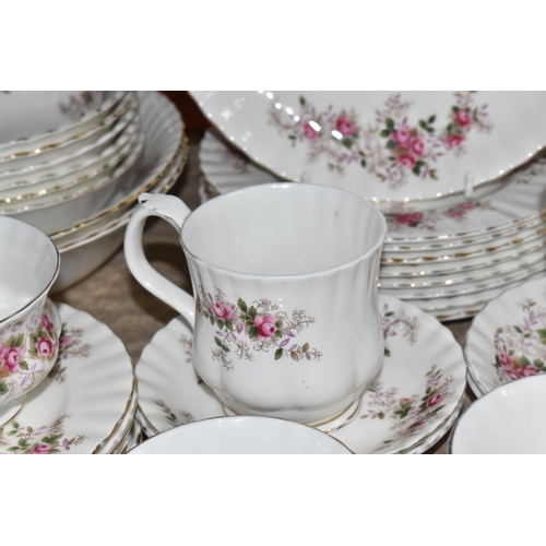 389 - A GROUP OF ROYAL ALBERT 'LAVENDER ROSE' DINNER WARE, comprising covered tureen, two oval serving bow... 