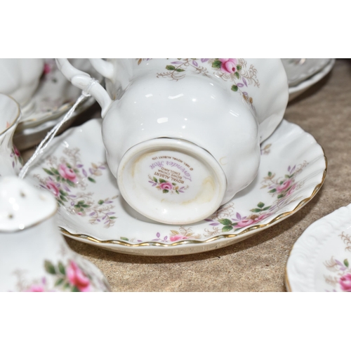 389 - A GROUP OF ROYAL ALBERT 'LAVENDER ROSE' DINNER WARE, comprising covered tureen, two oval serving bow... 