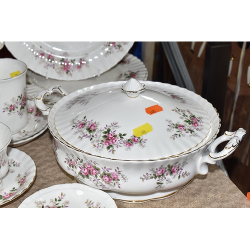 389 - A GROUP OF ROYAL ALBERT 'LAVENDER ROSE' DINNER WARE, comprising covered tureen, two oval serving bow... 