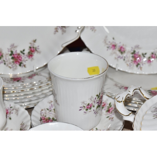 389 - A GROUP OF ROYAL ALBERT 'LAVENDER ROSE' DINNER WARE, comprising covered tureen, two oval serving bow... 