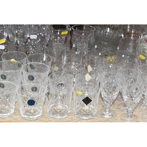 390 - A LARGE COLLECTION OF CUT GLASS ITEMS, to include a variety of crystal drinking glasses, to include ... 