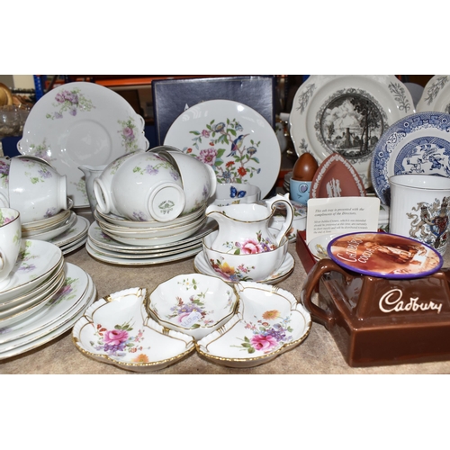 397 - A COLLECTION OF CERAMICS, to include, a vintage blue and white willow pattern style plate advertisin... 