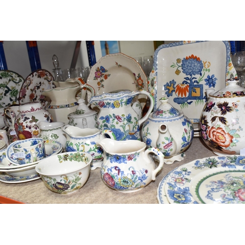 399 - A LARGE COLLECTION OF MASON'S IRONSTONE CERAMICS, to include in green 'Chartreuse' design: plate, sm... 