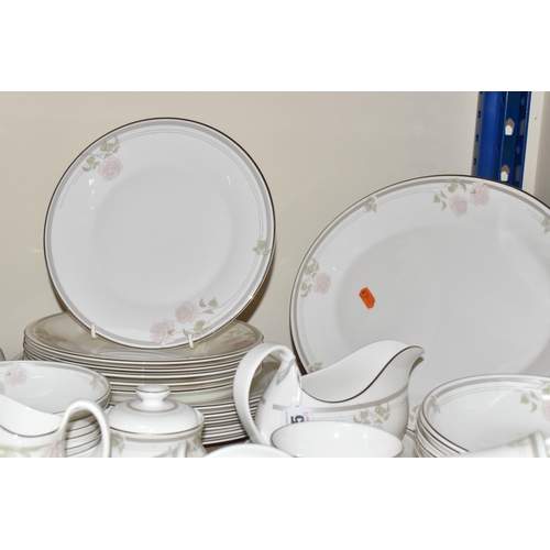 405 - A FIFTY-ONE PIECE ROYAL DOULTON 'TWILIGHT ROSE' DINNER SERVICE comprising six tea cups (one dull whe... 