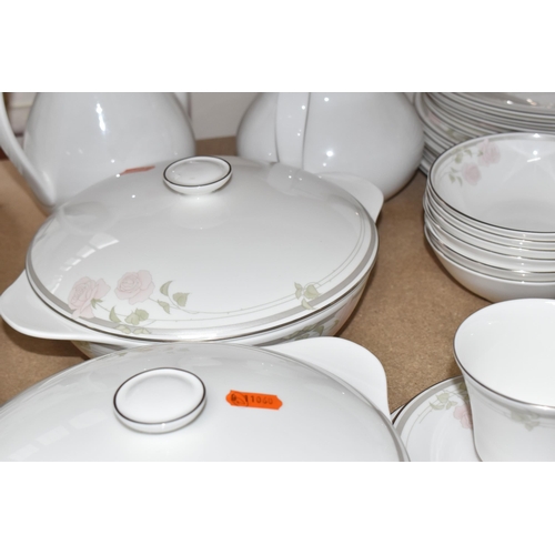 405 - A FIFTY-ONE PIECE ROYAL DOULTON 'TWILIGHT ROSE' DINNER SERVICE comprising six tea cups (one dull whe... 