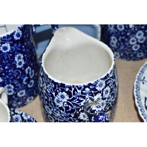 420 - A LARGE GROUP OF MOSTLY BLUE AND WHITE BURLEIGH WARES comprising two 'Willow' teacups with three sau... 