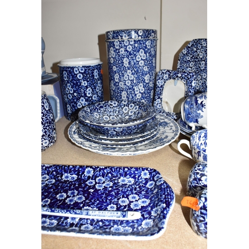 420 - A LARGE GROUP OF MOSTLY BLUE AND WHITE BURLEIGH WARES comprising two 'Willow' teacups with three sau... 