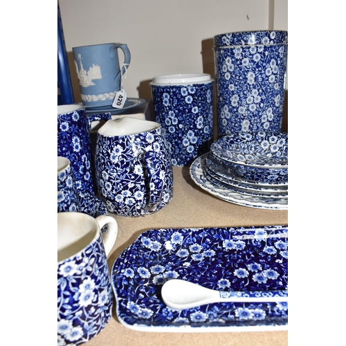 420 - A LARGE GROUP OF MOSTLY BLUE AND WHITE BURLEIGH WARES comprising two 'Willow' teacups with three sau... 