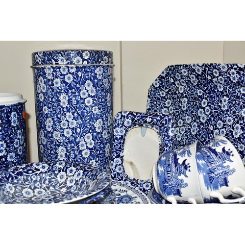 420 - A LARGE GROUP OF MOSTLY BLUE AND WHITE BURLEIGH WARES comprising two 'Willow' teacups with three sau... 