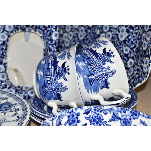 420 - A LARGE GROUP OF MOSTLY BLUE AND WHITE BURLEIGH WARES comprising two 'Willow' teacups with three sau... 