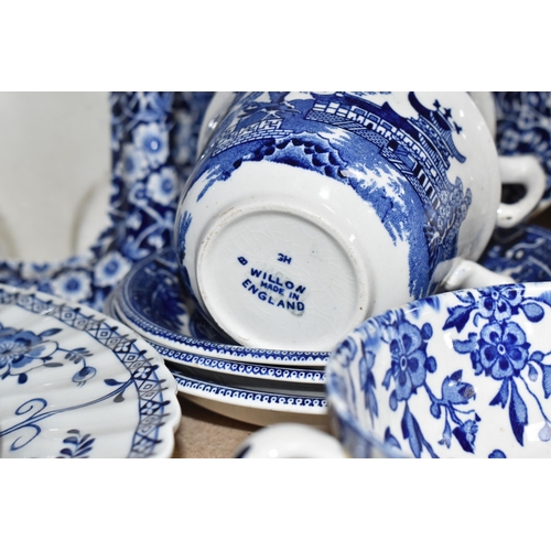 420 - A LARGE GROUP OF MOSTLY BLUE AND WHITE BURLEIGH WARES comprising two 'Willow' teacups with three sau... 