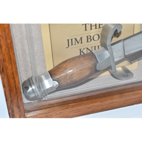 435 - A CASED FRANKLIN MINT 'THE JIM BOWIE KNIFE', blade etched 'J. Bowie', in a glazed case with leaflet,... 