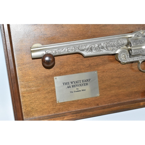 436 - A FRANKLIN MINT REPLICA 'THE WYATT EARP .44 REVOLVER', with display board bearing plaque, certificat... 