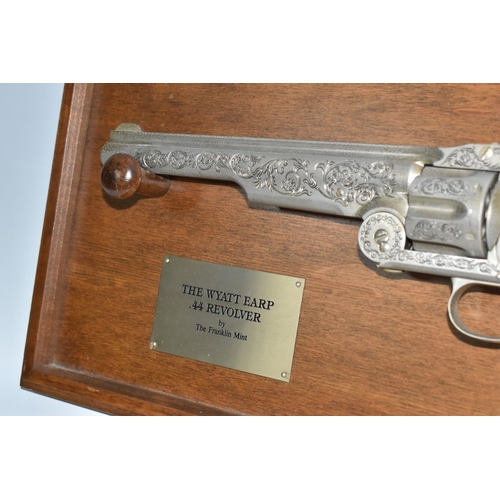 436 - A FRANKLIN MINT REPLICA 'THE WYATT EARP .44 REVOLVER', with display board bearing plaque, certificat... 