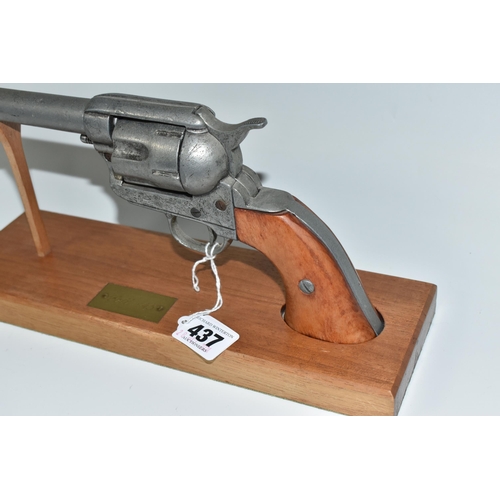 437 - A REPLICA COLT .45 REVOLVER, with a wooden stand bearing a brass plaque (1) (Condition Report: appea... 