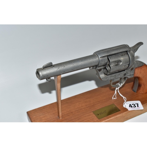 437 - A REPLICA COLT .45 REVOLVER, with a wooden stand bearing a brass plaque (1) (Condition Report: appea... 