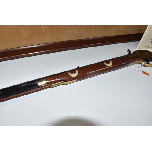 438 - A FRANKLIN MINT REPLICA 'OLD BETSY, DAVY CROCKETT'S .41 CALIBER RIFLE' on a wooden display board, wi... 