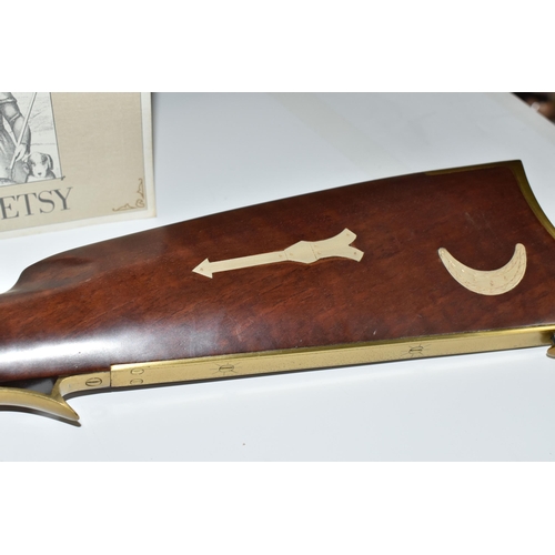 438 - A FRANKLIN MINT REPLICA 'OLD BETSY, DAVY CROCKETT'S .41 CALIBER RIFLE' on a wooden display board, wi... 